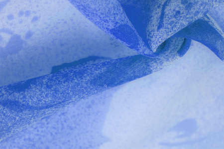 Texture. background. template. Abstract blue silk chiffon fabric. Artistic layout in denim silk taffeta color.の写真素材