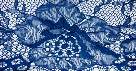 Blue lace fabric on a white background. Fancy African tulle lace fabric polyester with full length...