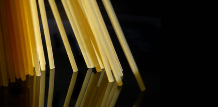 photograph of human food. Spaghetti - Long, thin, firm, cylindrical pasta with noodles. It is a...
