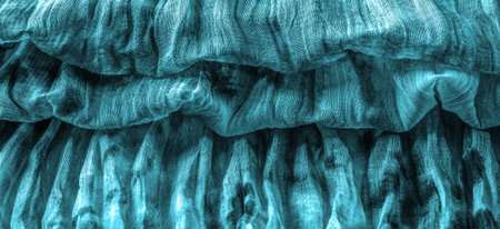 Blue fabric. Silk fabric in fine organza with panther print, Crumpled texture. Background. Template.