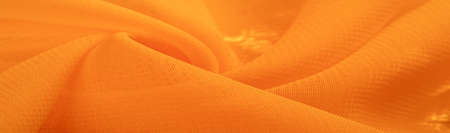 Texture. Background. Template. the feel, appearance, or consistency of a surface or a substance. Yellow silk fabricの写真素材