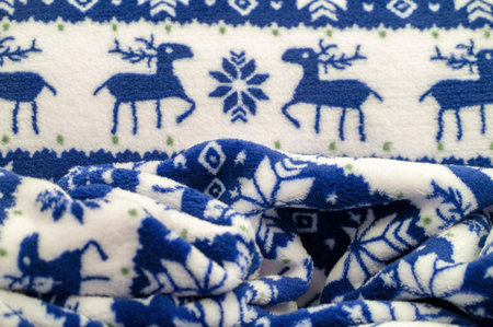 Velvet. Plush. For winter wear. Snow deer, snowflakes. Blue and white tones. Silk fabric with soft,...