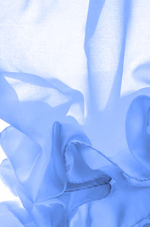 blue silk fabric, beautiful smooth elegant wavy blue satin silk luxury fabric, abstract design. background texture, patternの写真素材