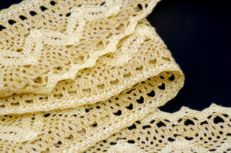 lace fabric. Embroidered fabric set. Close-up, lace decoration with ribbons, embroidered flower...