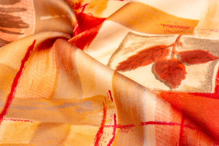 Brown-red-beige fabric with an abstract pattern, a print of branches with leaves of flora....