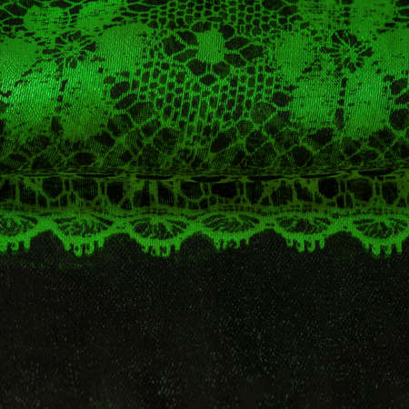 green background from textile material. lace fabric. Natural emerald texture. Texture, background, pattern.の写真素材