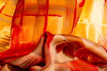 Brown-red-beige fabric with an abstract pattern, a print of branches with leaves of flora....