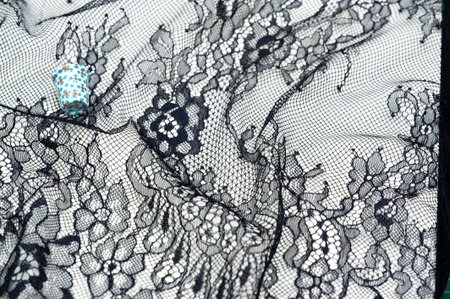 Black lace fabric. Vintage floral background. dark black vintage old floral lace
