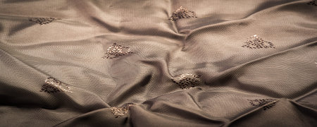 silk fabric, color brown, delicate pattern, pattern in the form of a combination of lines, shadows....
