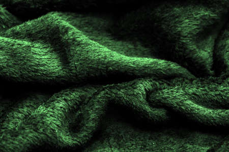Velvet. Plush. Deep euirid green. fabric with an even pile, longer and less dense than velvet. Expensive or spectacularly luxurious. luxuriously furnished, rich, dearの写真素材