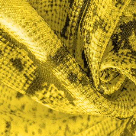 yellow fabric with a pattern of squares, background texture of bright yellow fabric close-up. background, texture, pattern,の写真素材