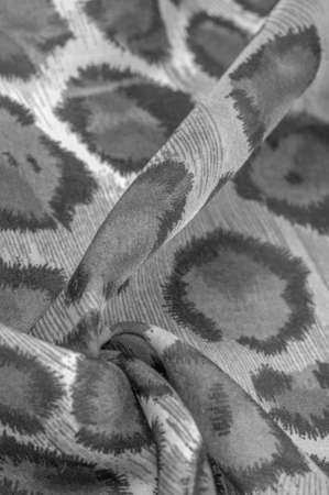 monochrome silk fabric, cheetah skin, african savannah theme. Background texture, patternの写真素材