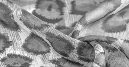 monochrome silk fabric, cheetah skin, african savannah theme. Background texture, patternの写真素材