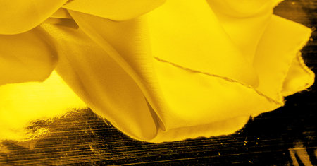 yellow silk fabric, beautiful smooth elegant wavy yellow satin silk luxury fabric, abstract design....