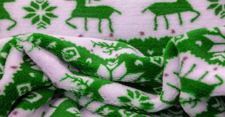 Velvet. Plush. For winter wear. Snow deer, snowflakes. Green and white tones. Silk fabric with soft,...