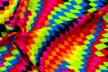 Lycra swimwear fabric. Beautiful lycra design. the colors are amazing! ... rhombs, squares in abstract order, red-yellow and azure blueの写真素材