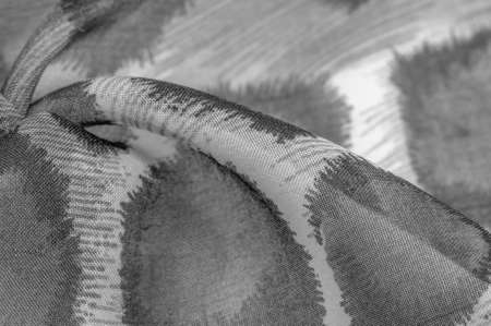 monochrome silk fabric, cheetah skin, african savannah theme. Background texture, patternの写真素材
