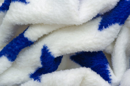 Velvet. Plush. Blue stars on a white background, new popular fabric, classic plush. This material...