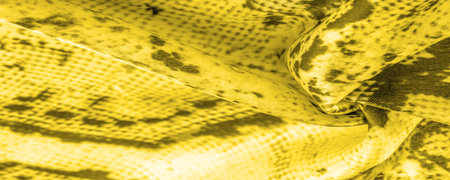 Background, texture, pattern, yellow fabric with a pattern of yellow squares, lines,