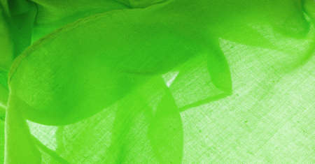 green silk texture, green fine grain fabric. desktop product, display perspective, studio photography. product demo banner.の写真素材