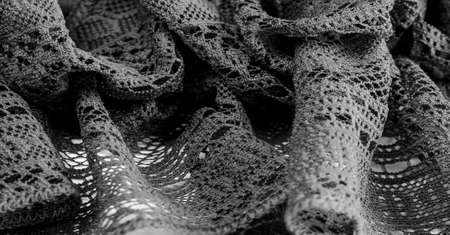 black lace fabric, sexy retro negligee material. Vintage lingerie ornament. background texture, pattern.の写真素材