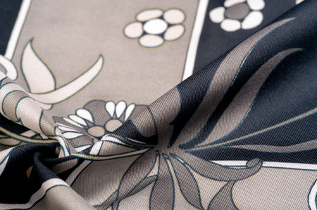 Black silk fabric with a print of white flowers, geometric lines. perfect for adding sophistication...