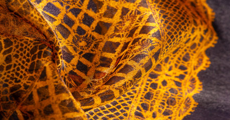 brown background from textile material. lace fabric. Natural amber texture. Texture, background,...