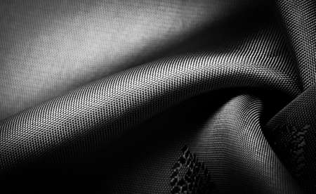 silk fabric, Dark black small pattern, a pattern that is a combination of lines, colors, shadows. texture background, patternの写真素材