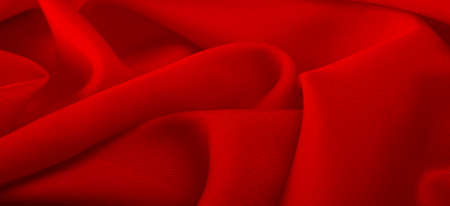 red silk fabric, ruby satin silk fabric, texture background, macro. abstract design.の写真素材