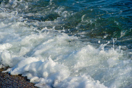 Shallow depth of field, Light wind, Waves, local weak coastal wind blowing during the day from the sea to land and at night from landの写真素材