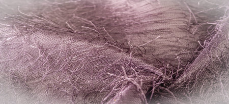 Brown, cappuccino silk fabric, woven threads on fabric, fluffy effect. Background texture, decorative ornamentの写真素材