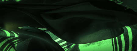 Green silk striped fabric. striped organza fabric. Background texture, decorative ornamentの写真素材