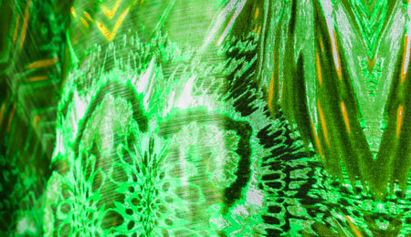 Silk of greenish-emerald hue. This luxurious silk chiffon fabric is sheer, flowing and super soft. Background texture, pattern.の写真素材