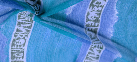abstract pattern on the fabric, a large braided thread, a pattern of blue white lines, this fabric...