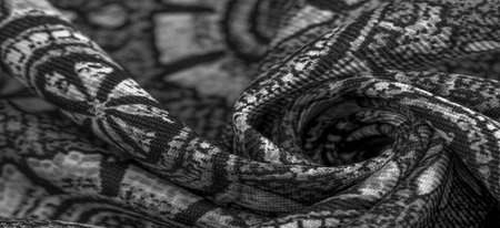 black and white, silk fabric with white drawings of flowers circles. Charmeus has a beautiful...
