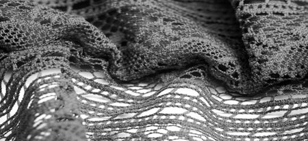 Black knitted lace triangular scarf, shawl, autumn winter scarf, hood, wedding accessories Project ideas, designer fashion accessories. textureの写真素材