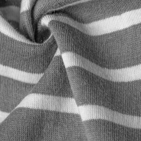fabric from gray and white woolen stripes, woolen knitwear, which is elegant and pleasant to work...
