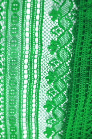 Green knitted lace triangular scarf, shawl, autumn winter scarf, hood, wedding accessories Project ideas, designer fashion accessories. textureの写真素材