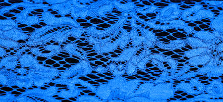 blue lace fabric, delicate embossed lace fabric, scalloped on both edges. Suitable for your projects, design, etc. Texture, backgroundの写真素材