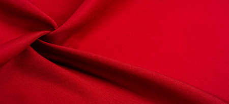 Texture, background, pattern, red silk fabric, this is silk satin weaving. Differs in density, smoothness and gloss of the front side, softness, it is well draped. Use design, projectsの写真素材