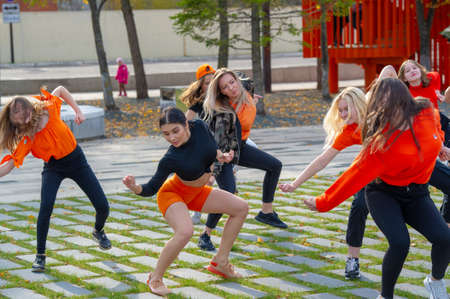 Dance group makes a video clip, girls in different clothes, cheerful mood, Russia Tatarstan Naberezhnye Chelny 14 07 2019のeditorial素材
