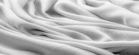 white fabric, twill. Thin fabric with diagonal weaving of threads. From Latin and French, the name of the material is translated Texture, backgroundの写真素材