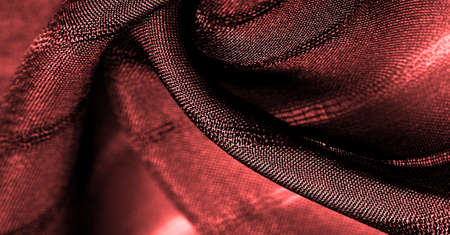 Texture, background, pattern, simple red fabric with lines. The lines formed by the extraction of the thread,の写真素材