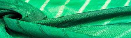 simple green fabric with lines. The lines formed by the extraction of the thread, Texture, background,の写真素材