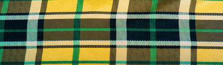 plaid fabric, yellow-green-white-blue colors, Scottish motifs in this fabric, your design with the sounds of bagpipes and aromatic whiskeyの写真素材