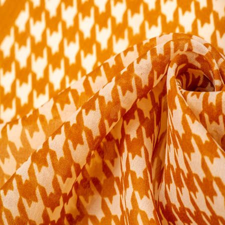 Delicate brown silk chiffon in vibrant colors with geometric print. Surprisingly light, smooth,...