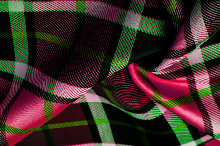 plaid fabric, red white black green colors, Scottish motifs in this fabric, your design with the sounds of bagpipes and aromatic whiskey.の写真素材