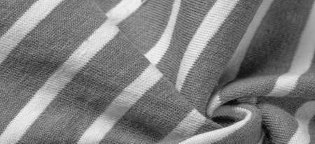 fabric from gray and white woolen stripes, woolen knitwear, which is elegant and pleasant to work with. Great for your projects. Texture, backgroundの写真素材