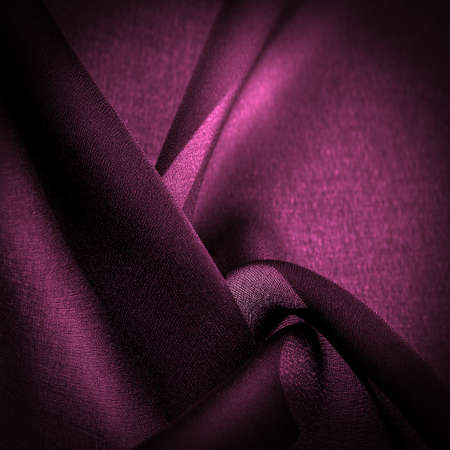 Transparent dark red chiffon, silk, red venetian abstract background. Green fabric close up. - it is a soft transparent fabric with a slight roughness (matte, crepe) due to the use of twisted yarnの写真素材