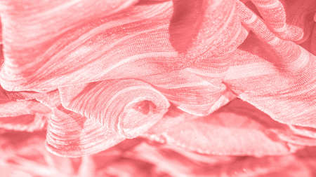 silk fabric. Texture of red wrinkled fabric. Red wrinkled fairy texture wavy surface, close-up, soft focus. background, patternの写真素材